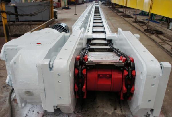 Скребково-шахтный транспортер